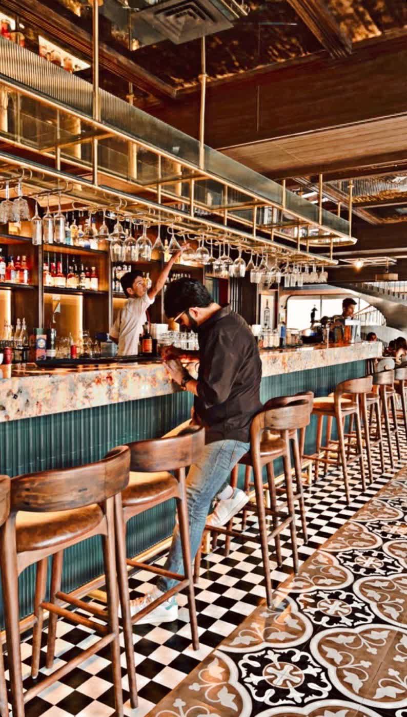 Indoor bar with hand-painted tiles